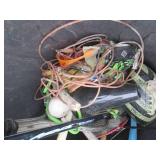 Rubbermaid trash can containing hoc...