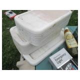 Plastic milk crate containing vinta...