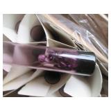 Large number of purple tone glass v...