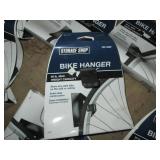 Metal bike hangers and bucket of as...