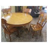 Gorgeous wood round pedestal dining...