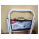 Assorted size step stools and a hel...