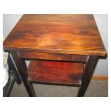 Deep tone wood side table with lowe...