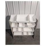 Storage Rack with Plastic Bins on Metal Shelving Unit