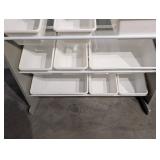 Storage Rack with Plastic Bins on Metal Shelving Unit
