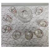 Hazel-Atlas Glass Company Pitcher with 8 Glasses.  These glasses feature the  "Pheasants" pattern, produced roughly 1950