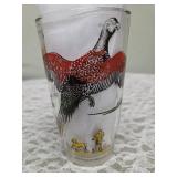 Hazel-Atlas Glass Company Pitcher with 8 Glasses.  These glasses feature the  "Pheasants" pattern, produced roughly 1950