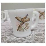 Six Vintage Anchor Hocking Fire-King milk glass mugs featuring the "Ring-Necked Pheasant" pattern.  These mugs were produced primarily between 1959-1962.
