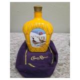 Three upcycled Crown Royal whiskey decanters that appear to be hand painted and decoupaged. The bottles come with Crown Royal velvet bags.The artist signature is Bickford that appears on the decanter.