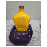 Three upcycled Crown Royal whiskey decanters that appear to be hand painted and decoupaged. The bottles come with Crown Royal velvet bags.The artist signature is Bickford that appears on the decanter.