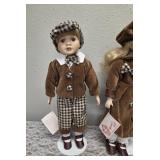 Three collectible porcelain dolls.  From the Premier Doll collection.