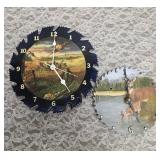 Two sawblade painted clocks.  The clock edged in black works (has new batteries) the other does not.