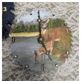 Two sawblade painted clocks.  The clock edged in black works (has new batteries) the other does not.
