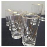 Seven  vintage Homer Laughlin Golden Wheat glasses.   Four vintage Homer Laughlin Golden Wheat tumblers.