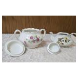 Vintage Sugar and Vintage Teapot.   The Teapot is marked on the bottom as genuine ironstone from the Ellgrive collection and the sugar bowl is Royal Firenza China.