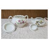 Vintage Sugar and Vintage Teapot.   The Teapot is marked on the bottom as genuine ironstone from the Ellgrive collection and the sugar bowl is Royal Firenza China.