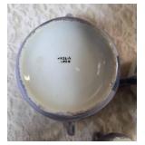 Vintage Art Deco Japanese Lusterware creamer and sugar bowl set.  Features a hand-painted iridescent glaze with a stylized abstract floral or geometric pattern.  Produced in Japan likely between 1921-