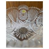 Vintage cut crystal pedestal centerpiece bowl for fruit/candy. Features a decorative metal stand with dangling prisms. Often categorized as Hollywood Regency or 19th Century style. Approx. 10" tall.