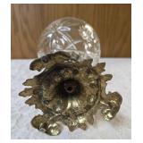 Vintage Hollywood Regency style centerpiece compote , featuring a cut or etched crystal glass bowl set upon an ornate brass pedestal base. Dimensions 8" t x 6"d.