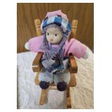 One - Horse windchime/mobile, One-bag of Cocktail napkins, One-bisque porcelain doll featuring a matte, realistic finish on its head, hands, and feet, and soft cloth body seated in a wooden rocking ch