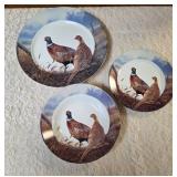 Set of Wild Wings collector plates.  Includes a 12" plate, 9" plate, and 6" plate.  All plates feature a pair of Ring-Necked Pheasants design.