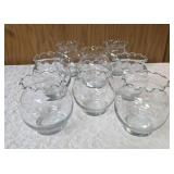 Eight piece vintage Anchor Hocking or Indianan Glass ruffled edge clear glass fish bowl, often used as a rose bowl or candle holder.