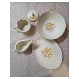 Vintage Homer Laughlin Golden Wheat set that includes a serving dish, serving bowl, sugar bowl and creamer. This set  likely produced in the 1950