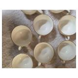 Vintage Homer Laughlin Golden Wheat set that includes a sugar bowl and creamer bowl and eight coffee cups. This set  likely produced in the 1950