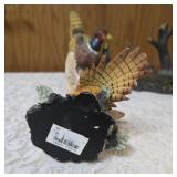 Three -Vintage Resin Figurines and 1 Pheasant on  Wagon Wheel Plate Holder.