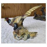 Three -Vintage Resin Figurines and 1 Pheasant on  Wagon Wheel Plate Holder.