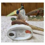 Three vintage collectible pheasant figurines made of ceramic or porcelain and three small pheasant figurines. Features hand painted details with a glossy finish.