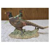 Three vintage collectible pheasant figurines made of ceramic or porcelain and three small pheasant figurines. Features hand painted details with a glossy finish.