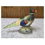 Three vintage collectible pheasant figurines made of ceramic or porcelain and three small pheasant figurines. Features hand painted details with a glossy finish.