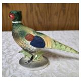 Three vintage collectible pheasant figurines made of ceramic or porcelain and three small pheasant figurines. Features hand painted details with a glossy finish.
