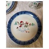 Vintage dinnerware set with 4 place settings is made by Thomson Pottery .  This set  is "Snowman Winterland Blue Sponge". Each place setting includes a dinner plate, salad plate, bowl and a mug.