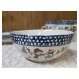 Vintage dinnerware set with 4 place settings is made by Thomson Pottery .  This set  is "Snowman Winterland Blue Sponge". Each place setting includes a dinner plate, salad plate, bowl and a mug.