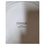 Vintage dinnerware set with 4 place settings is made by Thomson Pottery .  This set  is "Snowman Winterland Blue Sponge". Each place setting includes a dinner plate, salad plate, bowl and a mug.