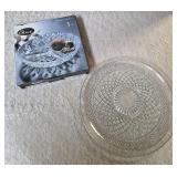 Two Glass Serving Plates.  These items are pre-owned.  One plate is a Vintage. Anchor Hocking Wexford  crystal plate and the other is a Gibson Home Jewelite 3-section glass relish tray.