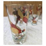 Eight vintage set of Hazel Atlas glassware in the Pheasant pattern, commonly found as part of Mid-Century Modern (MCM) barware sets and 3 shot glasses. Features flying pheasants in red, black and gold