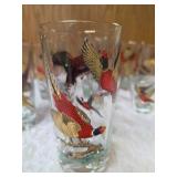 Eight vintage set of Hazel Atlas glassware in the Pheasant pattern, commonly found as part of Mid-Century Modern (MCM) barware sets and 3 shot glasses. Features flying pheasants in red, black and gold