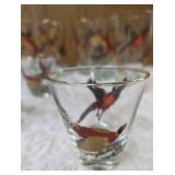 Eight vintage set of Hazel Atlas glassware in the Pheasant pattern, commonly found as part of Mid-Century Modern (MCM) barware sets and 3 shot glasses. Features flying pheasants in red, black and gold