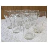 Eight Vintage Coco-Cola glasses.