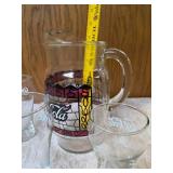 Four Vintage Coco-Cola glasses and Coca-Cola Tiffany-style stained glass Pitcher.