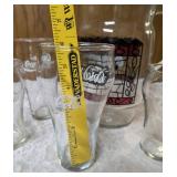 Four Vintage Coco-Cola glasses and Coca-Cola Tiffany-style stained glass Pitcher.