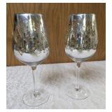 Three LTD 6" Ceramic Canisters and Two Metallic finished wine glasses.  The canisters and the wine glasses both have holiday themes.