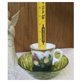 Collection of Decorative items.  Green glass vase, Angel figurine  and small Angel with a bell,  Green Acrylic Bowl and Vintage Bavarian Floral patterned teacup.