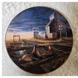 Terry Redland.  Two Terry Redland plate holders  with Two Terry Redland plates. The plates are "Country Road" and "Prairie Skyline".