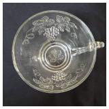 Vintage dishes: Mikasa Christmas Woods Canape Tray, Hazel Atlas vintage leaf-shaped clear glass relish or candy dish , vintage Anchor Hocking clear pressed glass snack tray featuring a grapevine and l