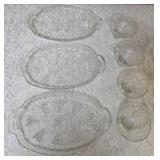 Vintage dishes: Mikasa Christmas Woods Canape Tray, Hazel Atlas vintage leaf-shaped clear glass relish or candy dish , vintage Anchor Hocking clear pressed glass snack tray featuring a grapevine and l