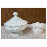 Vintage Fenton hobnail milk glass set features a lidded compote or candy dish and a matching smaller bowl .  The smaller bowl is 2 1/2" Tall.  Popular throughout the mid-20th century.